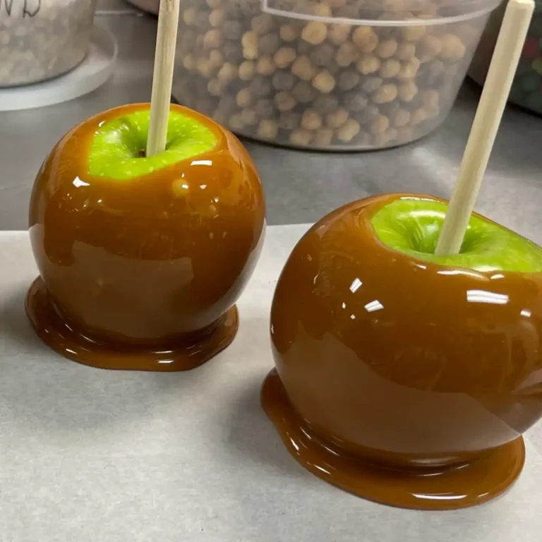 Two Granny Smith Apples dipped in Caramel.